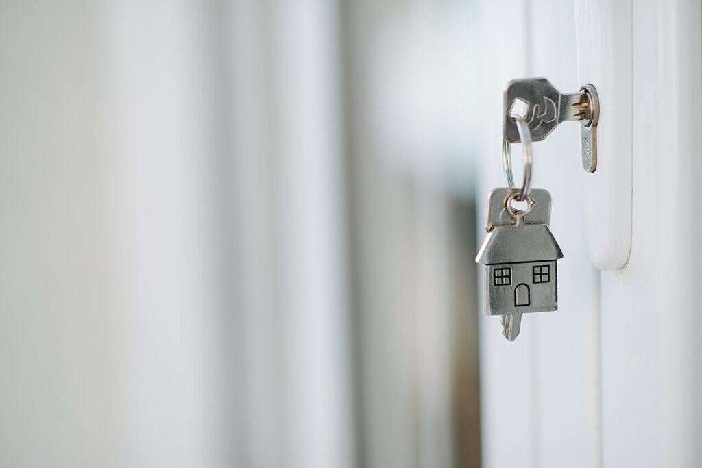 Close-up of the key with house keychain